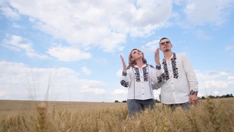 a family in embroidered dresses sings the national anthem a family in embroidered dresses sings the national anthem of ukraine in the middle of a wheat field independence day of ukraine