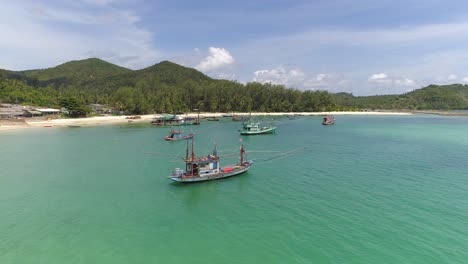 fishing boats moored in tropical lagoon