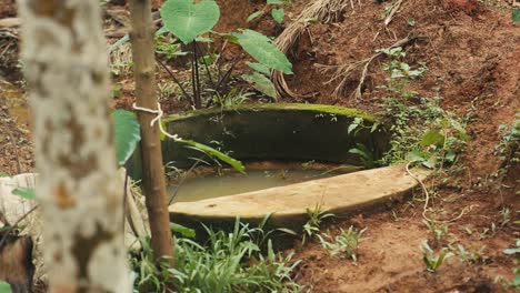 Close-up-gimbal-shot-of-open-well-in-farm