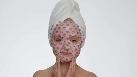 Niña-Aplicando-Mascarilla-Facial-Hidratante-Cosmética,-Tratamiento-Para-El-Cuidado-De-La-Piel-De-Adolescentes,-Cosmética-Natural