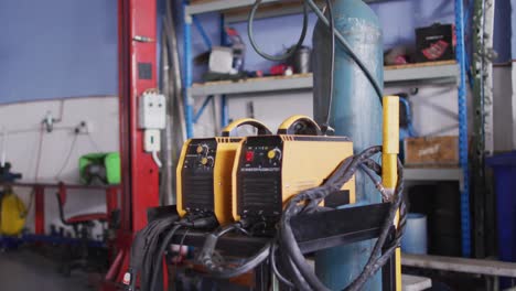 video of diverse machines and tools in car repair shop