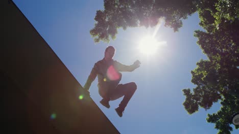 caucasian man practicing parkour