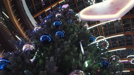 grand christmas tree in a modern shopping mall