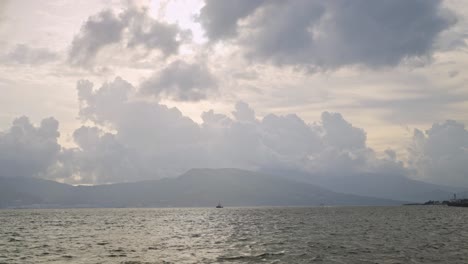 gentle ocean waves ripple under a clear, endless sky, creating a serene and tranquil seascape.