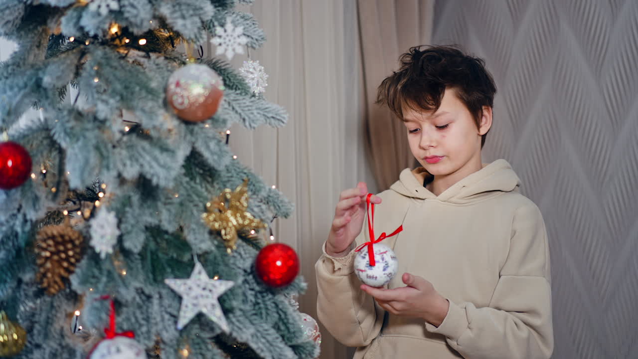 Boy Decorating Christmas Tree