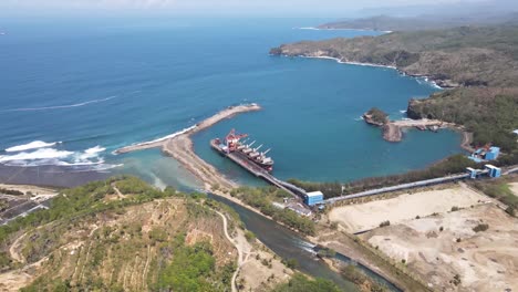 aerial view of an industrial port in the southern coastal area of ​​pacitan regency, east java, indonesia