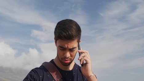 Young-man-talking-on-the-phone