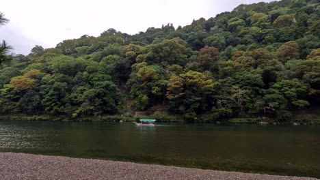 oi river boat tours at arashiyama kyoto, japan