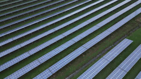 solar panels in solar park, endless patterns, diagonal lines, slow drone flight