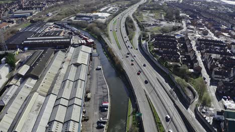 Aerial-footage-of-the-A50,-A500-motorway,-dual-carriage-way-in-the-heart-of-the-city-of-Stoke-on-Trent-in-Staffordshire,-Commuters-travel-north-and-south-on-the-roads