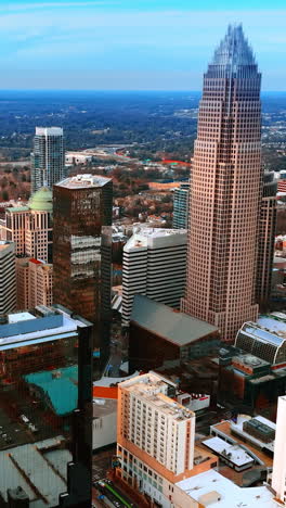 densely built architecture in the city downtown. top view of charlotte, north carolina, usa at daytime. vertical video