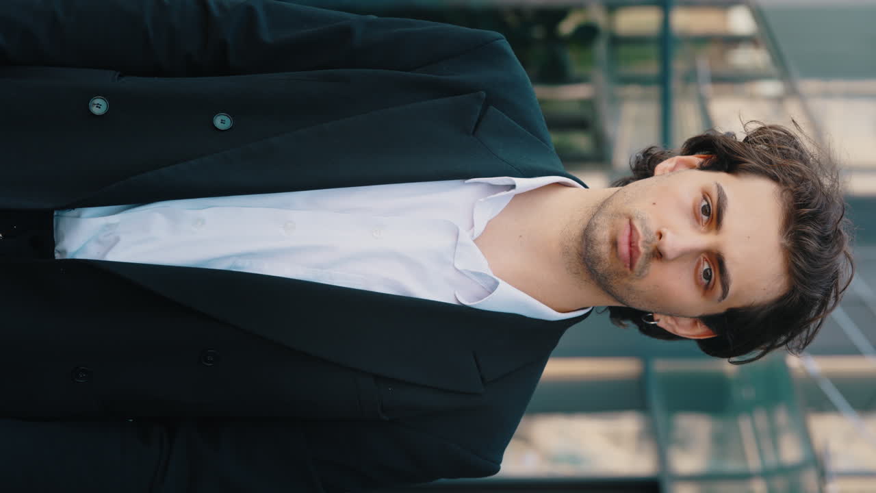 Confident Businessman in Suit with Arms Crossed