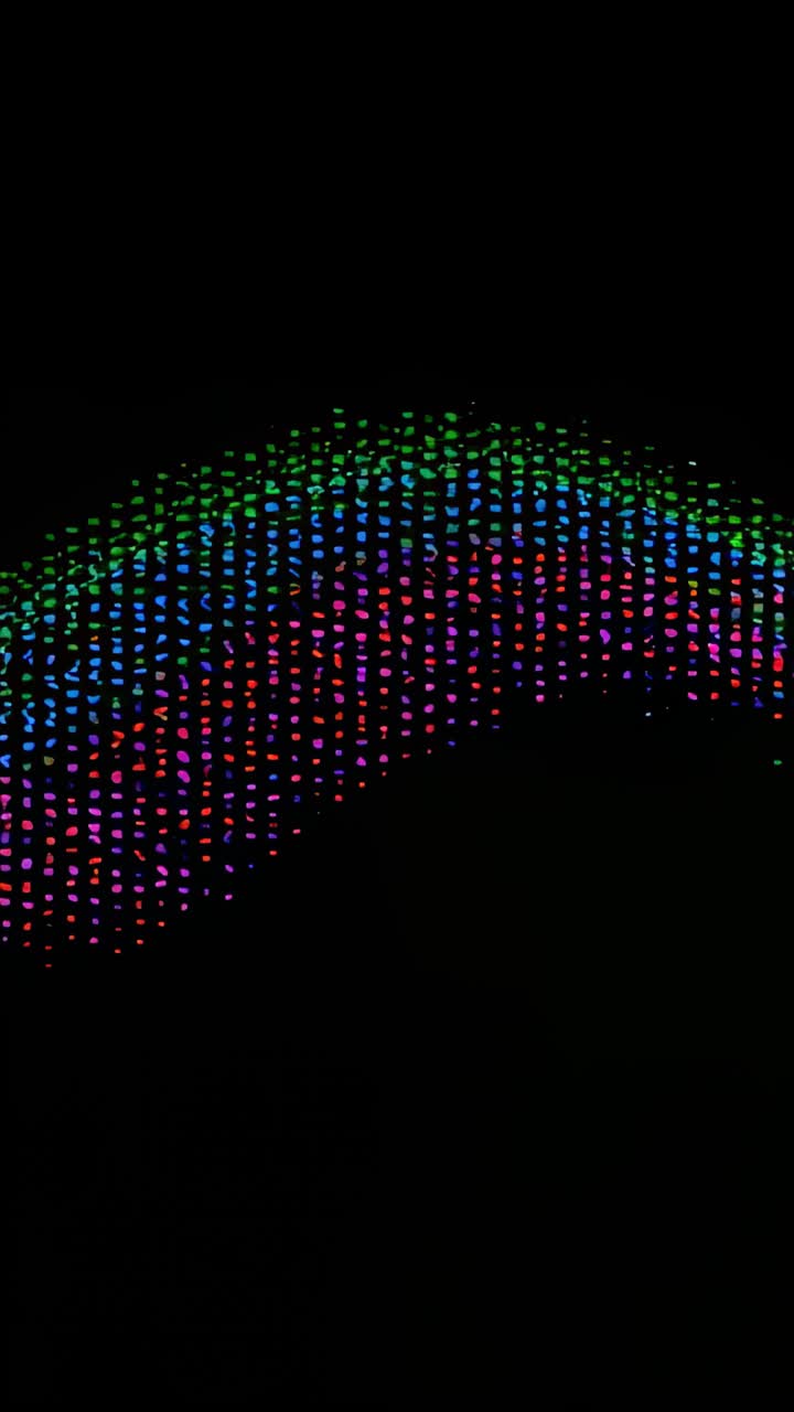 Vertical video: Animating RGB dot ribbon shifting right across black canvas, forming LED grid