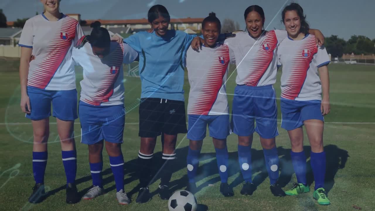Animation of speedometer over multiracial female soccer players with arms around standing on ground