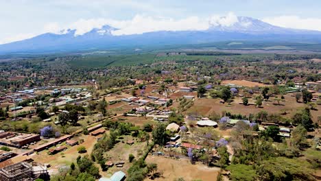 rural village town of kenya with kilimanjaro in the background