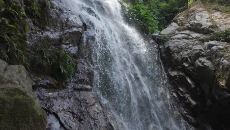 Water-cascading-down-rocks-at-the-Second-Marinka-Waterfall-in-Minca,-Colombia,-surrounded-by-nature