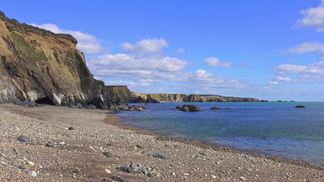 Ireland Epic Locations spring arrives on The CopperCoast waterford calm seas and puffy clouds