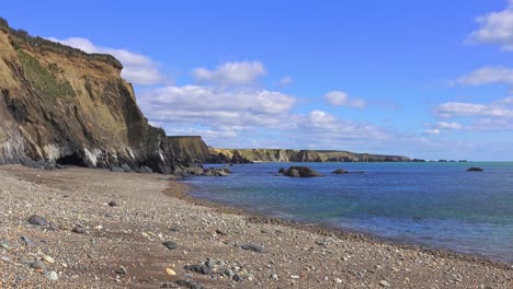 ireland epic locations spring arrives on the coppercoast waterford calm seas and puffy clouds