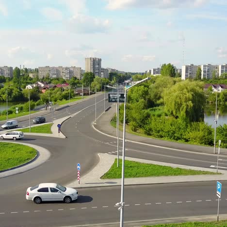 circular movement at the traffic intersection. vinnitsa, ukraine - july 2017: aerial view of roundabout in the city in the summer in ukraine