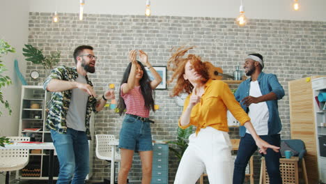 friends dancing in a room