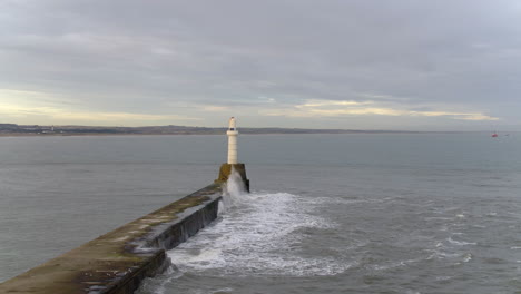 Aerial-view-of-the-South-Breakwater-at-the-entrance-to-Aberdeen-harbour,-Aberdeenshire,-Scotland