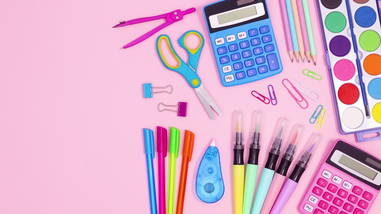 Pastel vibrant school accessories appear on pastel pink theme. Stop motion