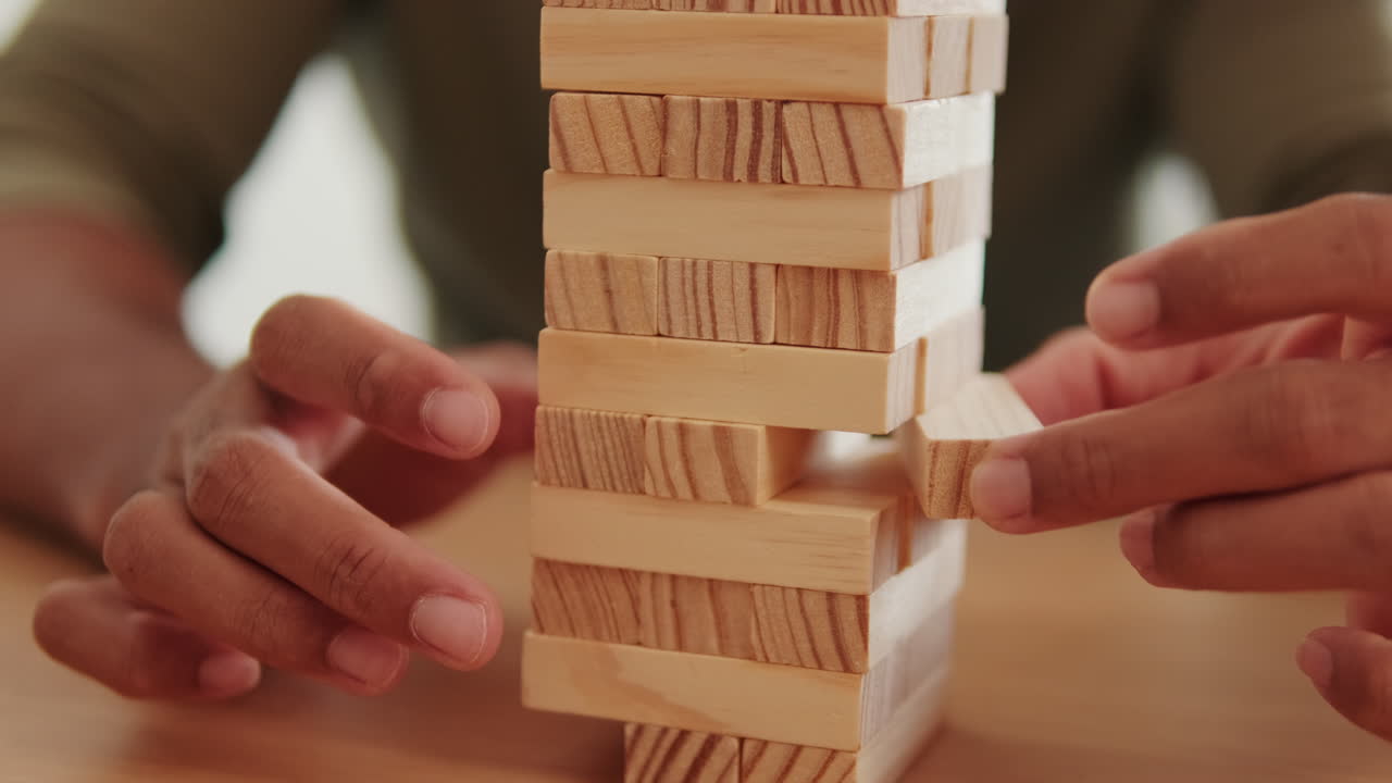 Playing Jenga at Home With Family