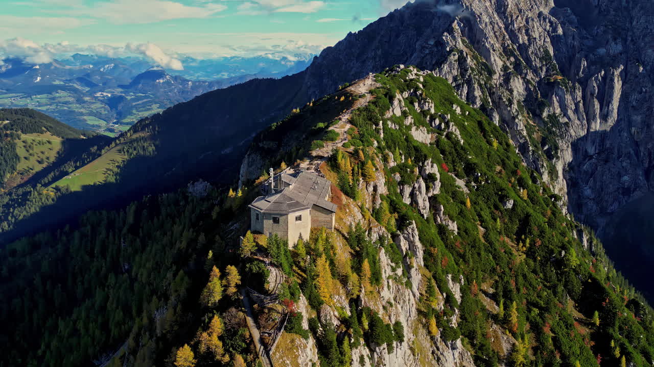 Aerial panoramic view of Historic mountaintop retreat The Eagle's Nest Kehlsteinhaus amid autumn forest, Germany