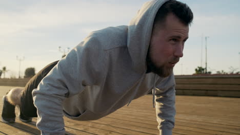 man doing push-ups outdoors