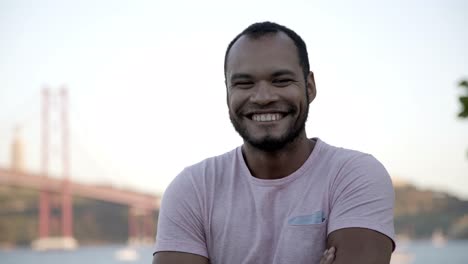 happy young man looking at camera