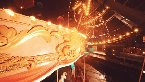 carousel and ferris wheel at night