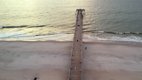 Aerial-overhead-the-fishing-pier-at-kure-beach-nc,-north-carolina