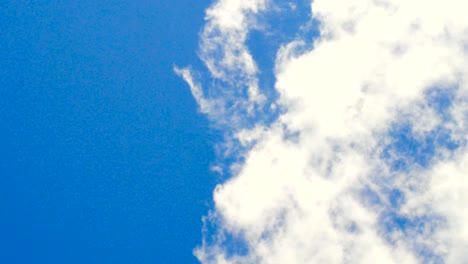 time lapse cloud mover under blue sky backdrop