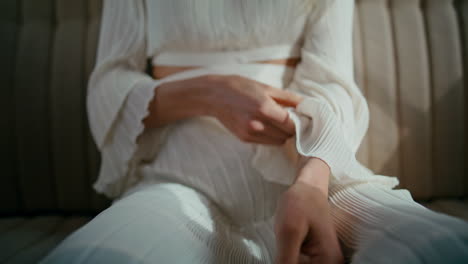 unknown stylish girl sitting in retro automobile back seat close up. woman relax