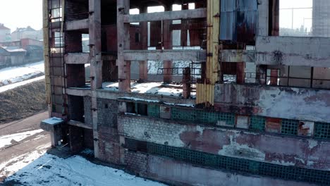 Dilapidated-industrial-building-at-Vlahita-with-snow,-Romania