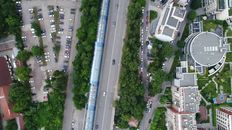 overpassing-a-city-road-and-buildings