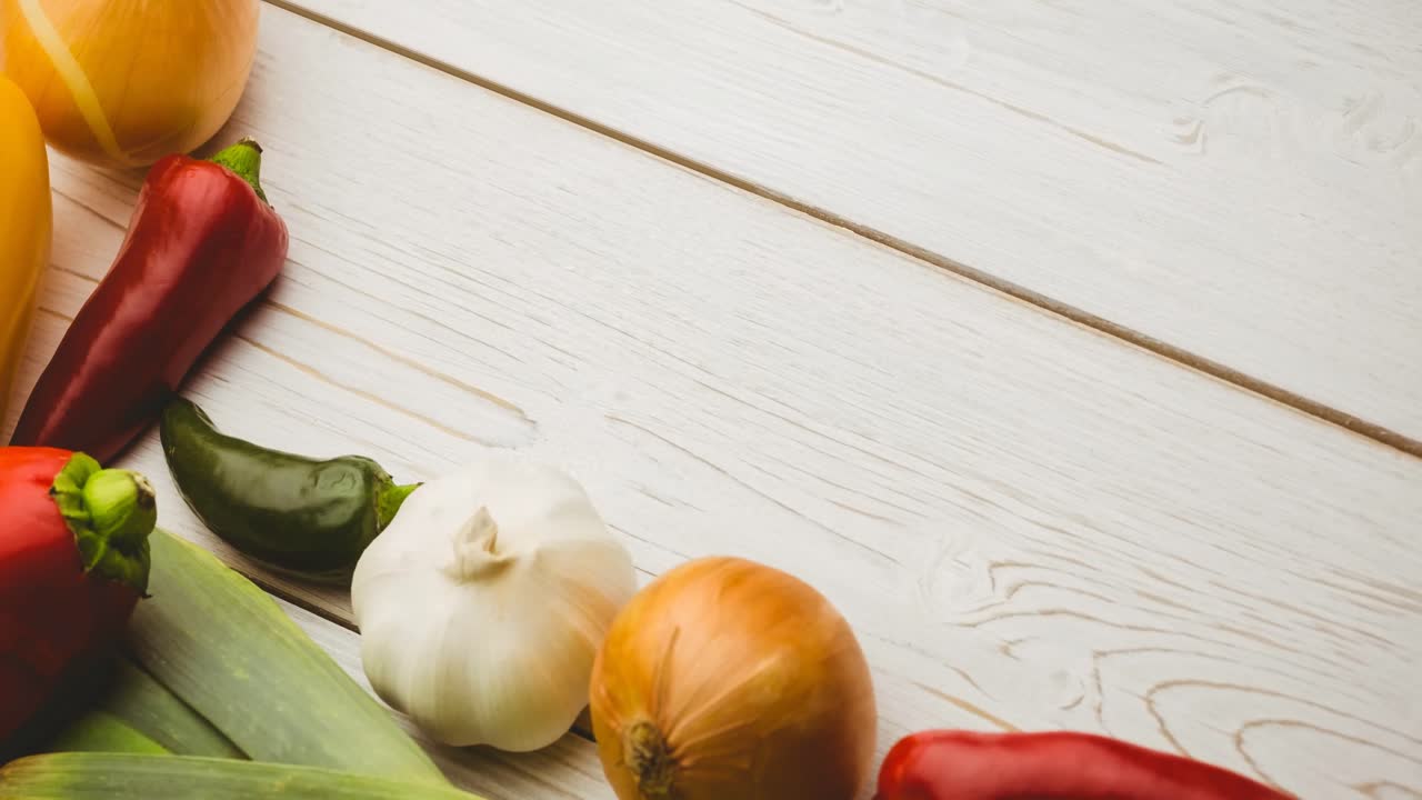 Video of fresh organic vegan food with vegetables on wooden boards
