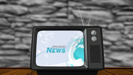 noticias de última hora escritas en el globo giratorio en el programa de televisión