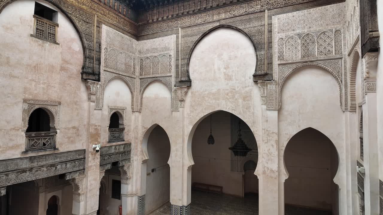 Interior courtyard riad garden in authentic Moroccan palace medina of Fes
