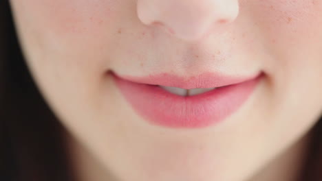 brunette woman with a beaming smile