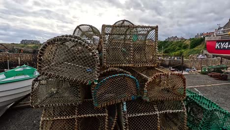 fishing traps and boats at crail harbor