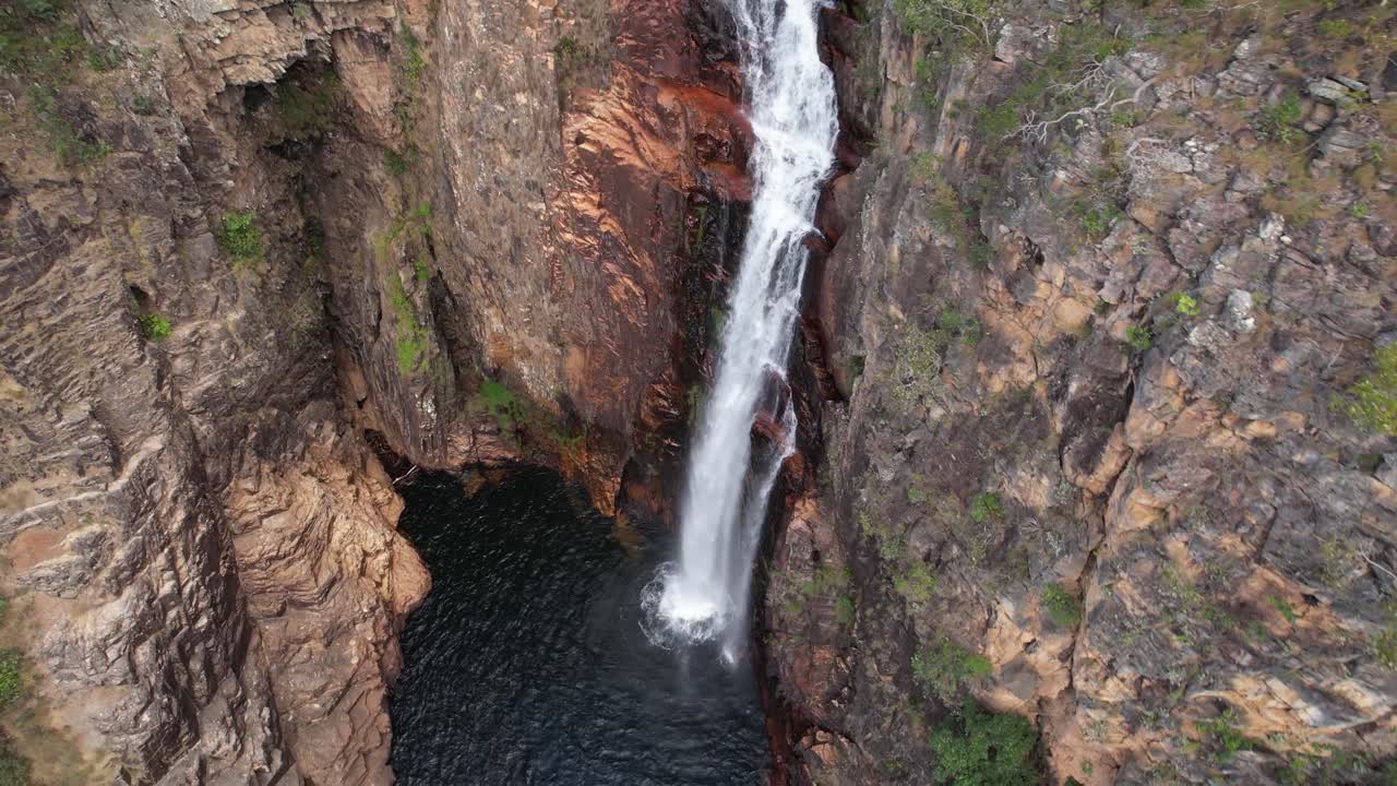 aerial video of a big waterfall at Chapada dos Veadeiros, Complexo do Macaco, Catedral Waterfall, Goias, Brazil