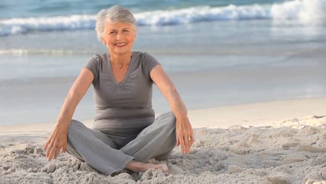 elderly woman doing yoga