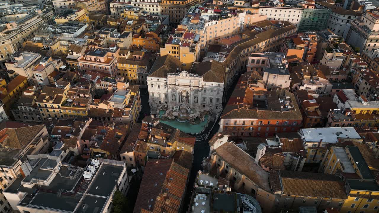 Cinematic Aerial View Above Trevi Fountain, Rome's Famous Baroque Landmark in Downtown City Center of Italian Capital