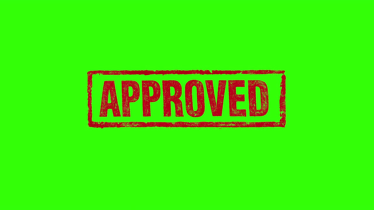 A realistic rectangular APPROVED rubber seal in deep red featuring an authentic distressed ink texture, worn edges natural imperfections for a genuine stamped appearance. 4K. Greenscreen
