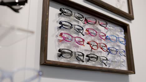 eye glasses on wall in an optometry, eye doctor clinic