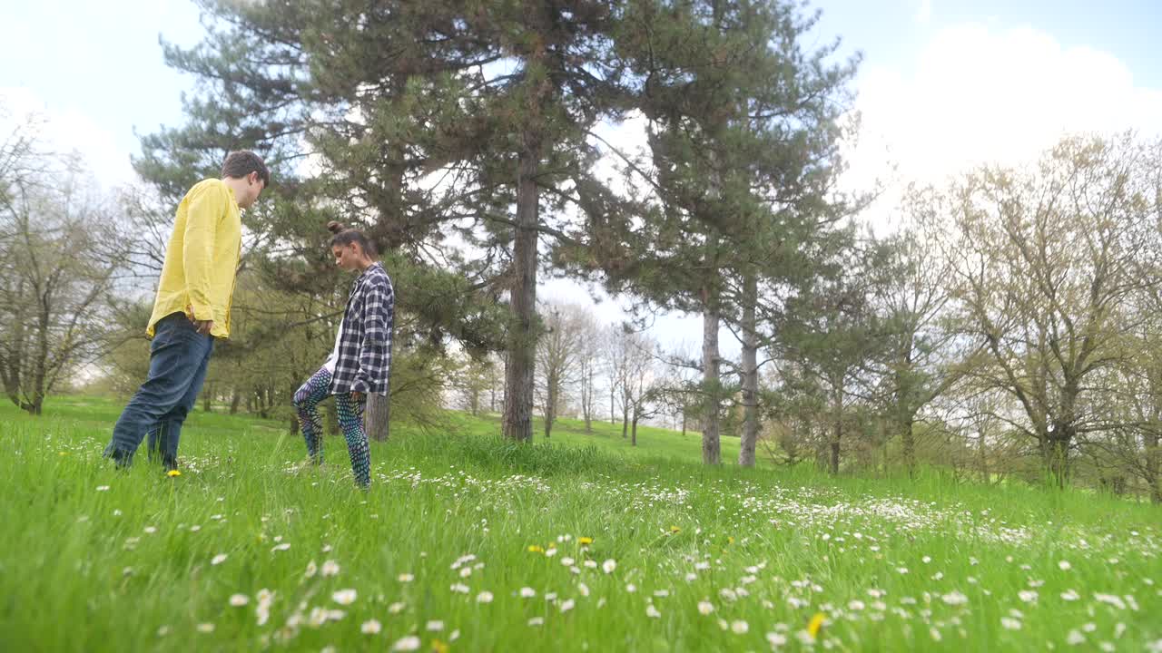 Friends Walking in a Spring Park