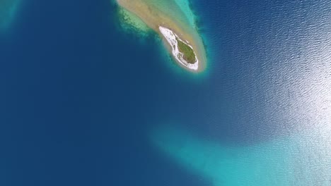 Aerial-drone-shot-top-view-over-on-a-island-Khuvsgul-lake-Mongolia