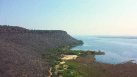 aerial drone shot of forest hills with tighra reservoir of gwalior madhya pradesh india