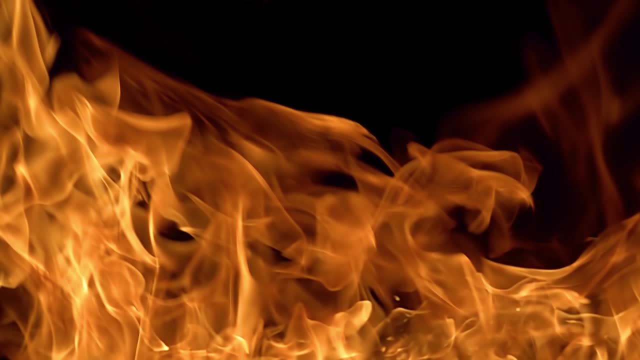 Flames of fire on black background in slow motion